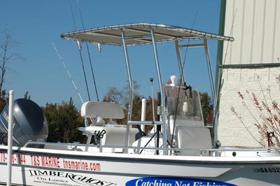 fishing guide boat with fishmaster t-top