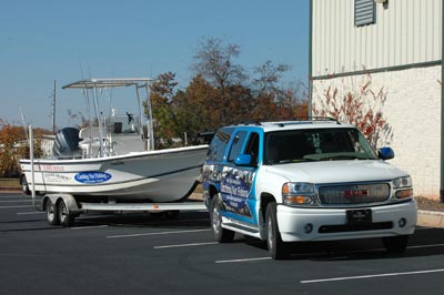 fishing guide boat with fishmaster t-top