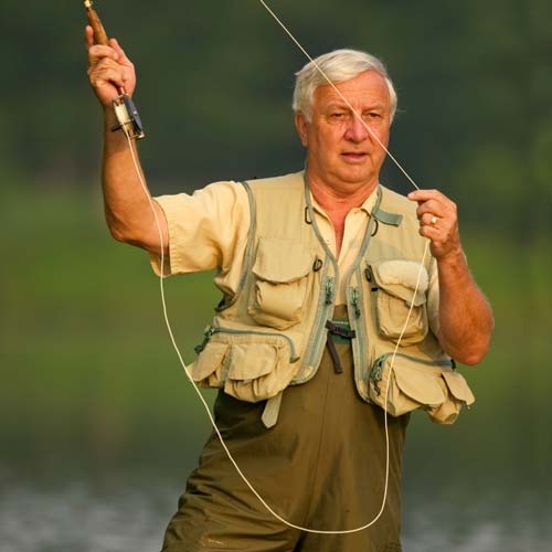 man casting fly fishing