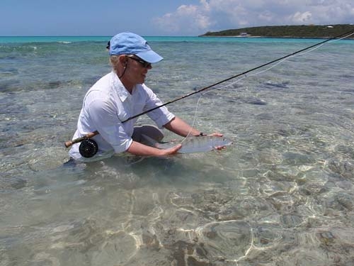 woman fishing in saltwater