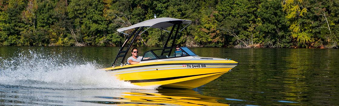 boat with monster tower bimini top