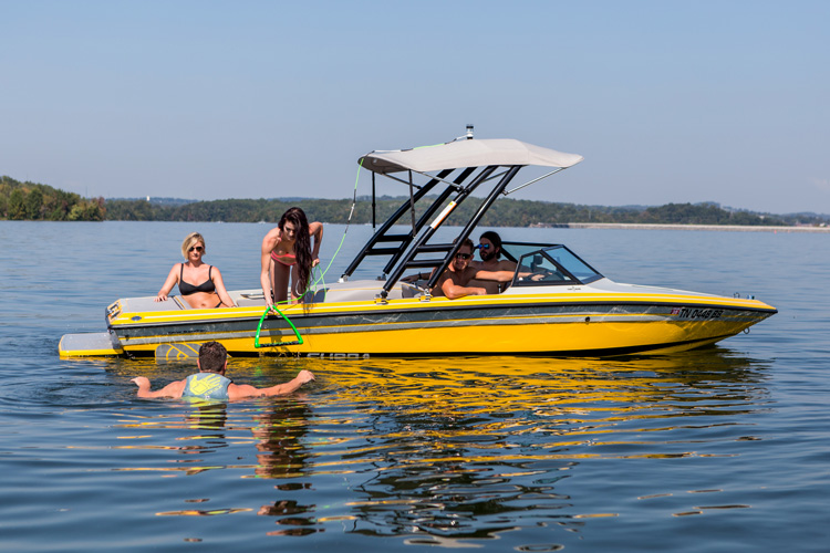 wakeboard boat with rider in the water