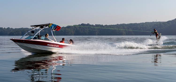 wakeboarding behind a boat